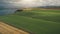 Sun fields with animals aerial. Farmlands nature landscape. Rural green and yellow pastures, meadows