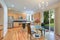 Sun filled gourmet kitchen with wooden cabinetry