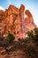 Sun flare between hoodoo sandstone towers in Southern Utah