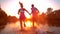 SUN FLARE: Sporty couple jogging in the serene nature at stunning golden sunrise