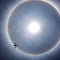 Sun Halo and an airplane taken from a rooftop in Mexico City