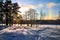 Sun halo at snowed lake