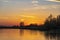 The sun has just gone down behind the trees along the lake Zoetermeerse Plas, Zoetermeer, Netherlands