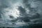Sun hiding behind the dark black clouds over the blue sky, dramatic sky, atmospheric moods and bad weather background
