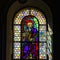 Sun light through the leaded pane in old majestic church