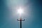 The sun is like a star of David and an electric pole like a Christian cross