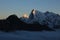 Sun lit mountains Ama Dablam and Cholatse at sunset