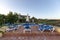 Sun lounger in front of a swimming pool and an finca