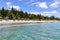 Sun lounger and turquoise water at Doklet beach.