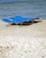 Sun loungers or beds on sandy beach
