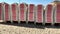 Sun loungers stacked on the beach