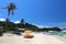 Sun lounges with umbrellas at Ilig Iligan Beach, Boracay Island, Philippines