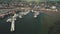 Sun marina with ships, yachts aerial. Epic cityscape of harbor town of Campbeltown, Scotland, Europe