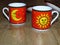 The sun and the moon on two fine porcelain ware tea coffee cups.