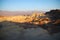 The sun of the morning highlights the dunes and colors of Zabriskie Point in the Death Valley desert