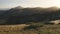 Sun mountain ridge nature landscape aerial. Swiss Alps range at spring sunset. Sun flares over peaks