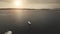 Sun over sail yacht at open sea aerial. Summer nobody nature seascape. Ship, sailboat at ocean bay