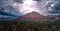 The sun peaks through the Sedona clouds