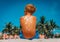 Sun protection- little boy with suncream at tropical beach