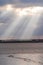 Sun rays beaming down over Thames Estuary in Essex, near purfleet, England