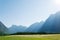 Sun rays in mountains lighting the valley, Norway