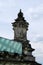 Sun rays on the sculptures on the roof of a Reichstag Cupola