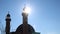 Sun rays shining through the windows of the mosque tower