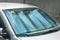 Sun reflector on the windscreen or windshield as protection of the car plastic indoor panel from direct sunlight and heat