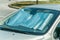 Sun reflector on the windscreen or windshield as protection of the car plastic indoor panel from direct sunlight and heat