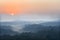 Sun rise above a fog and mountain