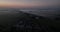 Sun rise in The Netherlands in springsummer, foggy dew in the morning aerial drone overhead view. Holland early morning