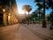 Sun rises over illuminated Plaza Real in in Gothic quarter of Ba