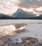 The sun rises over Mt Rundle overlooking the famous Vermilion Lakes