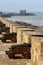 The sun rises overa row of canons at the former fortress at Essaouira in Morocco.