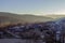 Sun rising on a mountain landscape on a winter townscape in Bellver de Cerdanya