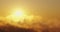 Sun rising over golden fluffy clouds in the sky, scenic color sea sunrise, 4k video