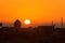 Sun rising over silhouette of Yazd.