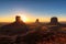 The sun\'s rays at dawn at Monument Valley, Arizona, USA