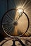 The sun's rays pass through the spokes on a bicycle wheel. AI Generated