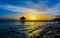 Sun sea tropical sunset view of the pier of the caribbean