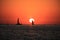 Sun set, boat and sailing