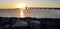 Sun set view. Beach. Stone. Abu dhabi. Water. Bridge. Evening. Sea