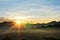 Sun set view over mountains with fog on floor ground in the morning. Alishan National Forest Recreation Area in Chiayi County,