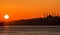 The sun sets over the Bosporus. Istanbul, silhouette of the Blue Mosque