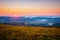 The sun sets over the mountain ranges. Carpathian mountains, Ukraine, Europe