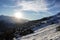 The sun sets over verbier in winter