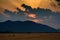 Sun settin behind Eastern Ghat Mountain range over Mahanadi river, copy space