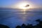 Sun setting above the horizon in Greymouth, West Coast, New Zealand