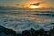 Sun setting above the horizon in Greymouth, West Coast, New Zealand