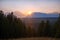 Sun setting behind the Grand Teton Mountain Range